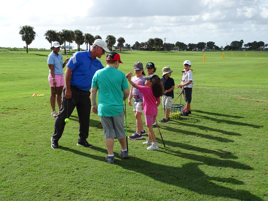Glen Beaver teaching Homeschool Group Golf 