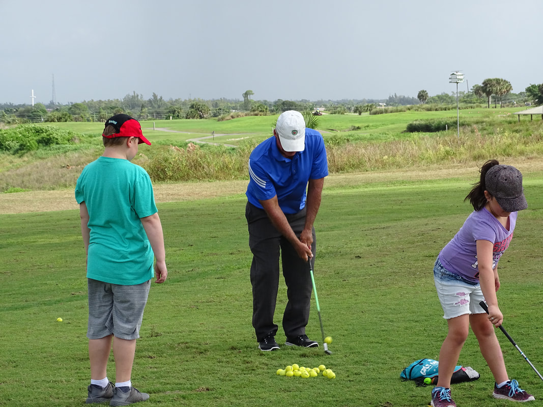 Glen Beaver demonstrates golf technique at Okeeheelee